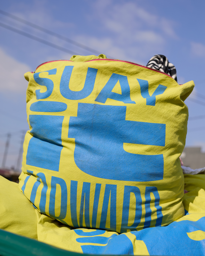 SPONSOR A SUAY IT FORWARD BAG — TURN FIRE RELIEF TEXTILES INTO WINTER SURVIVAL